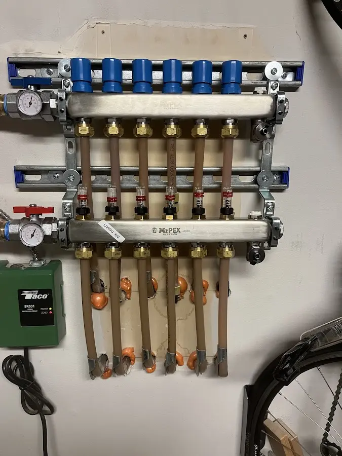 Plumber performing Gas Leak Detection at a residential property in Allen Park